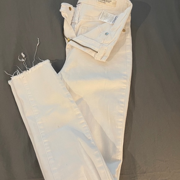 White skinny jeans with stretch and slightly distressed.  Never been worn. 27 - Picture 6 of 10